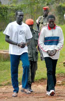 PRA suspects being led by military police. Undated. The Independent.jpg